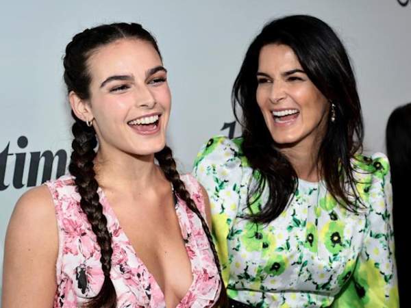 Finley Faith Sehorn and Angie Harmon in flower dresses